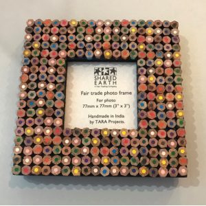 photo frame decorated with slices of coloured pencil crayons