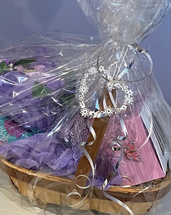 flower trug gift basket perfect for Mother's day with a soap flower bouquet, stemless wine glass and real flower reed diffuser