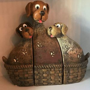Dog family snuggled up in a basket ornament