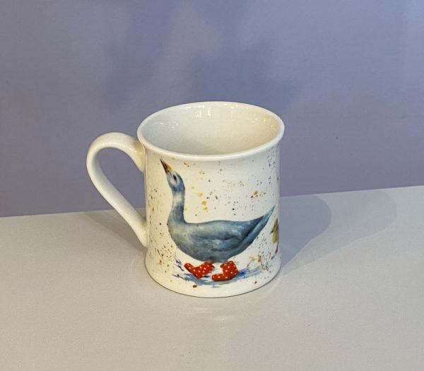 Classic white mug with a cute duck and ducklings in boots splashing in puddles