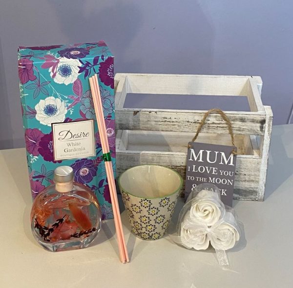 Mothers Day gift crate with a diffuser, pampering soap roses and flower pot with a metal sign